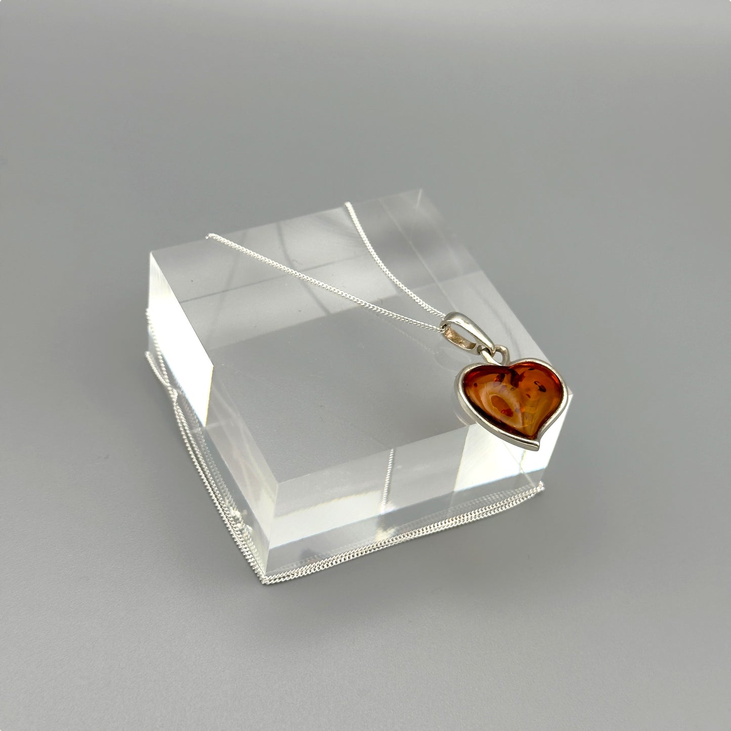 Close-up of heart-shaped Baltic amber necklace