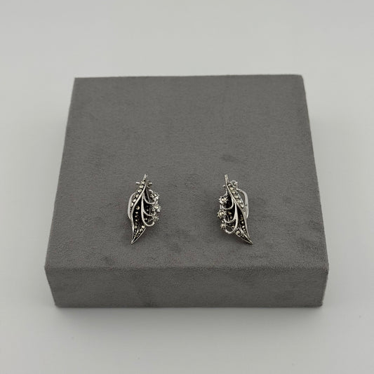 sterling silver leaf inspired earrings with crystal stones