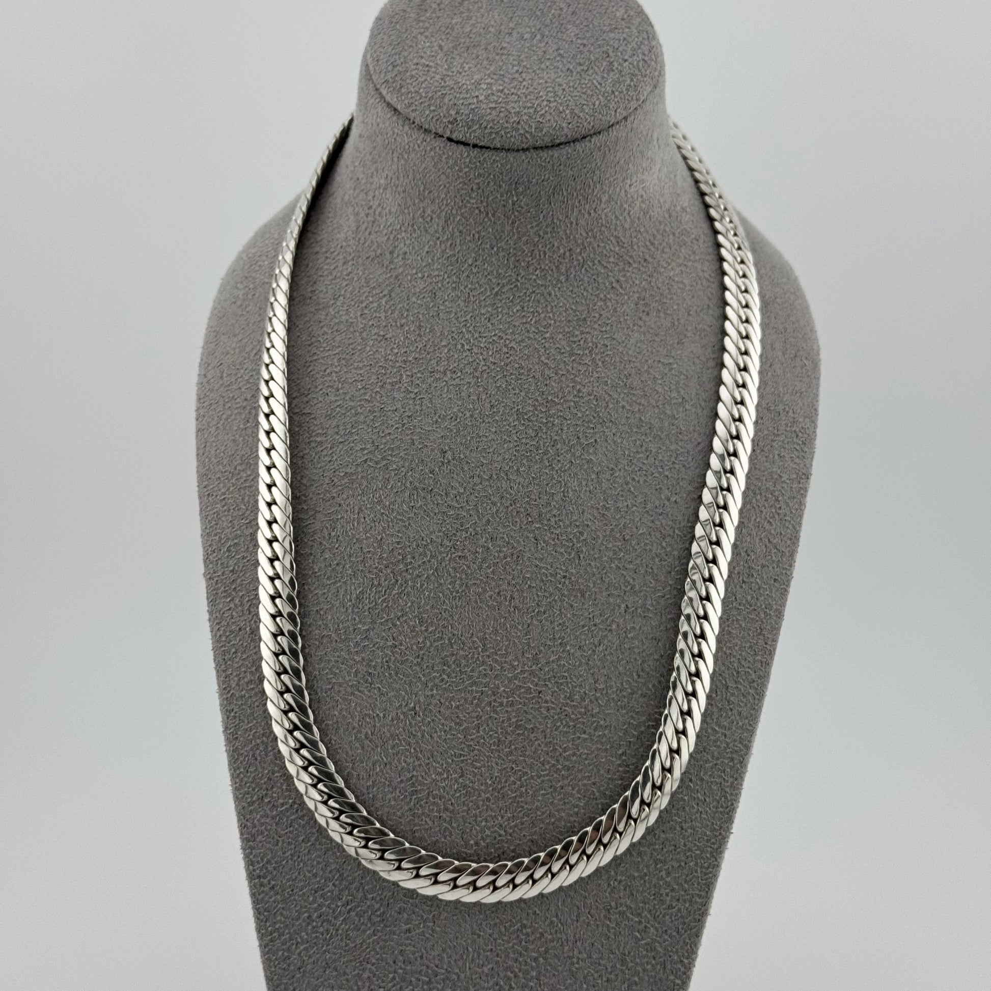 sterling silver heavy  herringbone chain 20 Inches in length on a grey bust