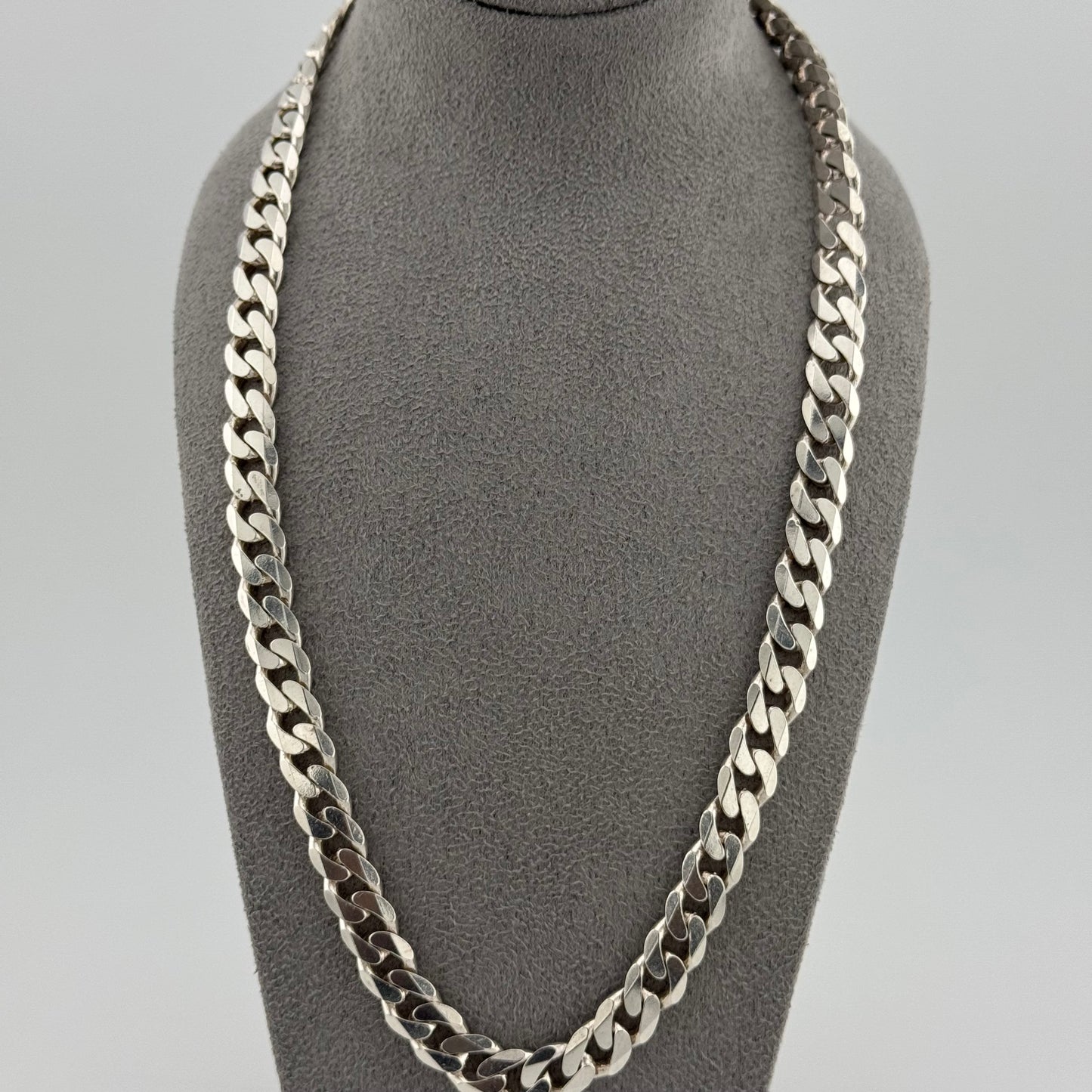 sterling silver heavy mens chain on a grey bust