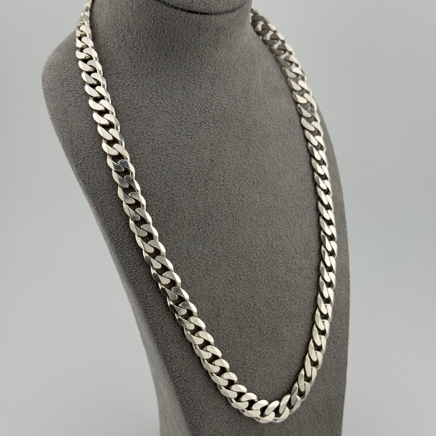 sterling silver heavy mens chain on a grey bust