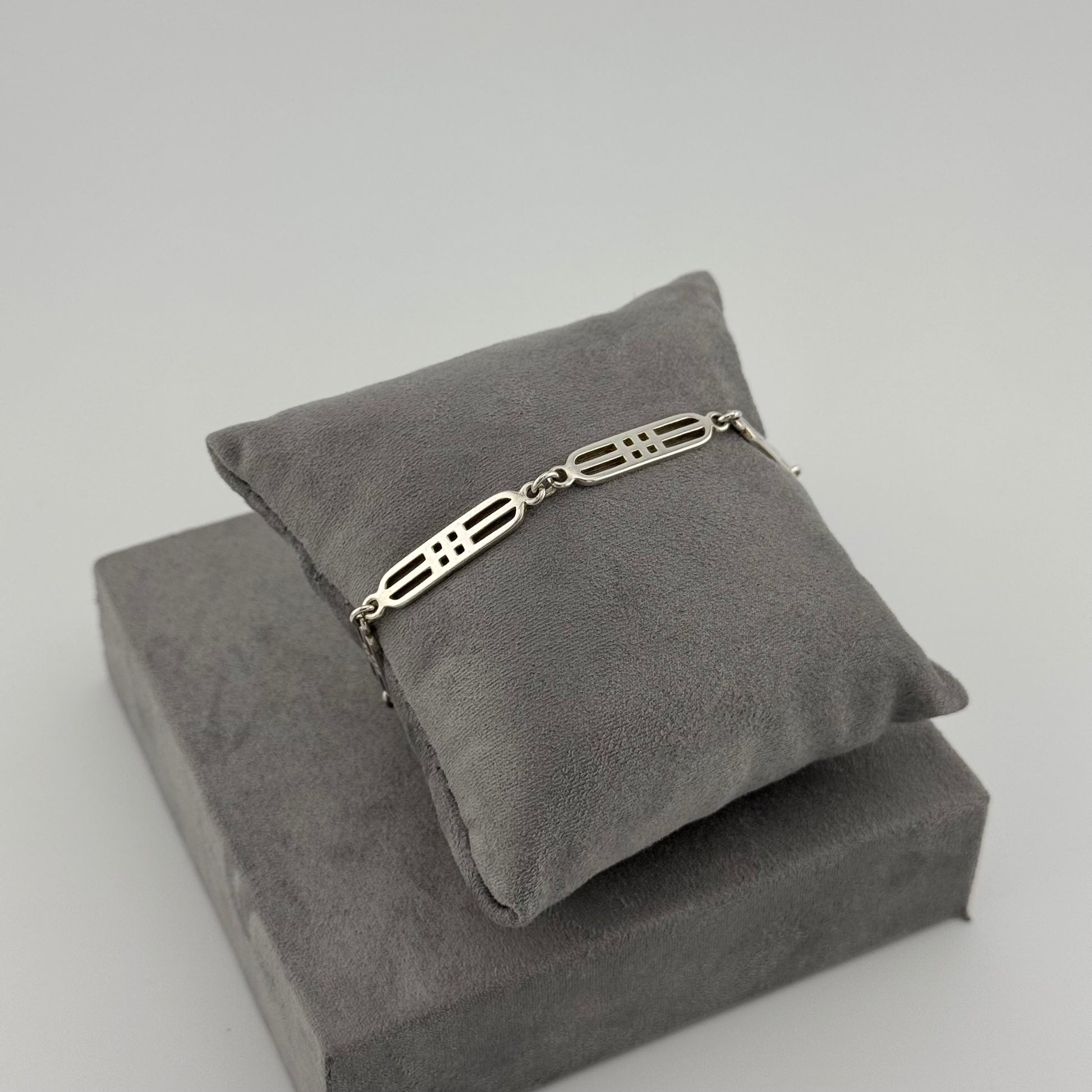 silver bracelet with geometric open link design