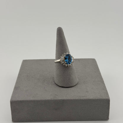 Blue Topaz Halo Ring - Sterling Silver