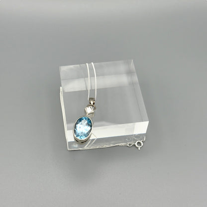 Sterling silver necklace with faceted aquamarine pendant
