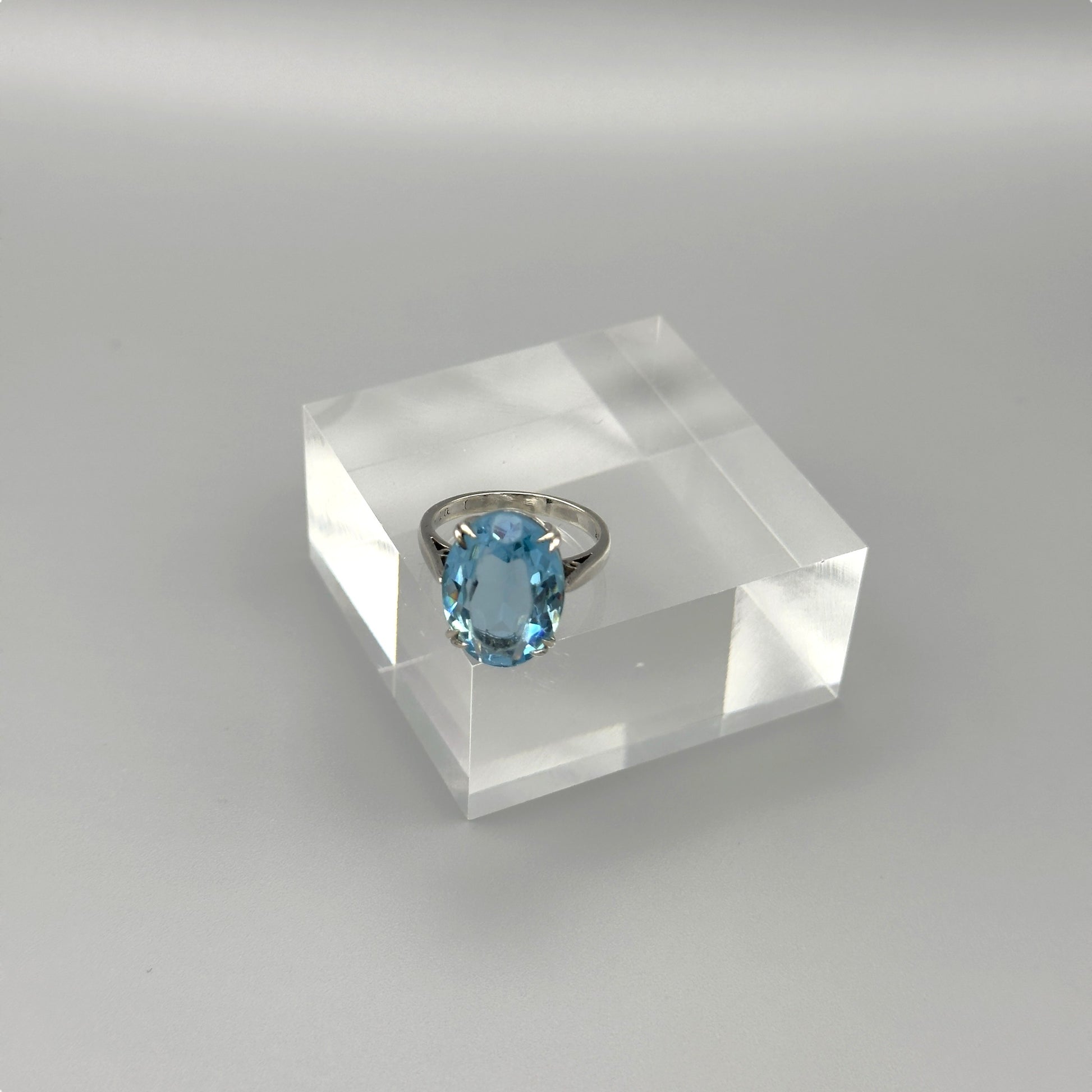 Side angle of blue gemstone solitaire ring