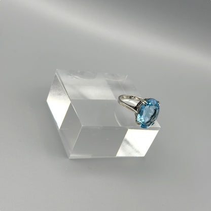 Oval aquamarine ring in silver four-prong setting