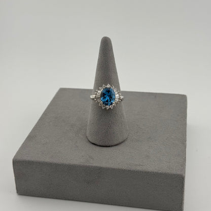 Blue Topaz Halo Ring - Sterling Silver