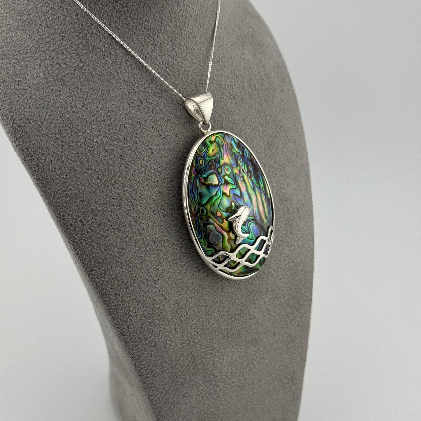 oval silver pendant with abalone shell