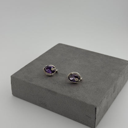 sterling silver amethyst earrings with an oval amethyst stone and floral design