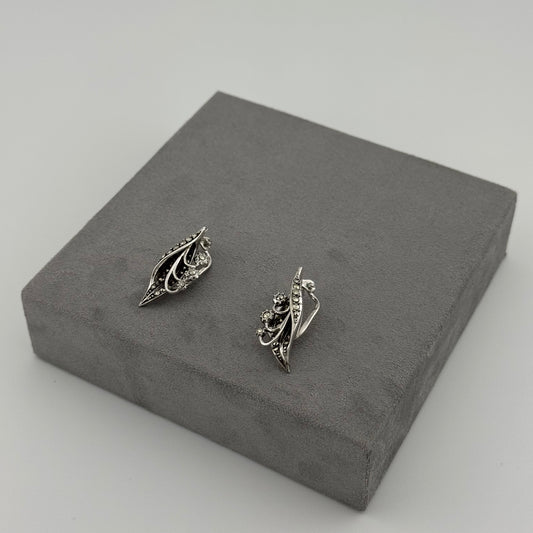 sterling silver leaf inspired earrings with crystal stones