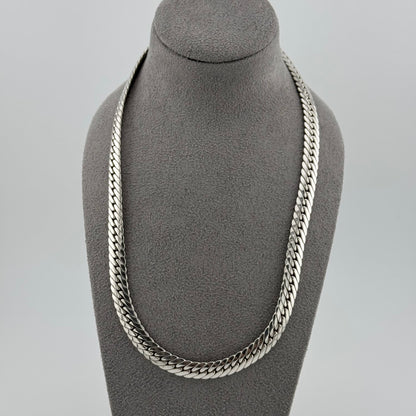 sterling silver heavy  herringbone chain 20 Inches in length on a grey bust
