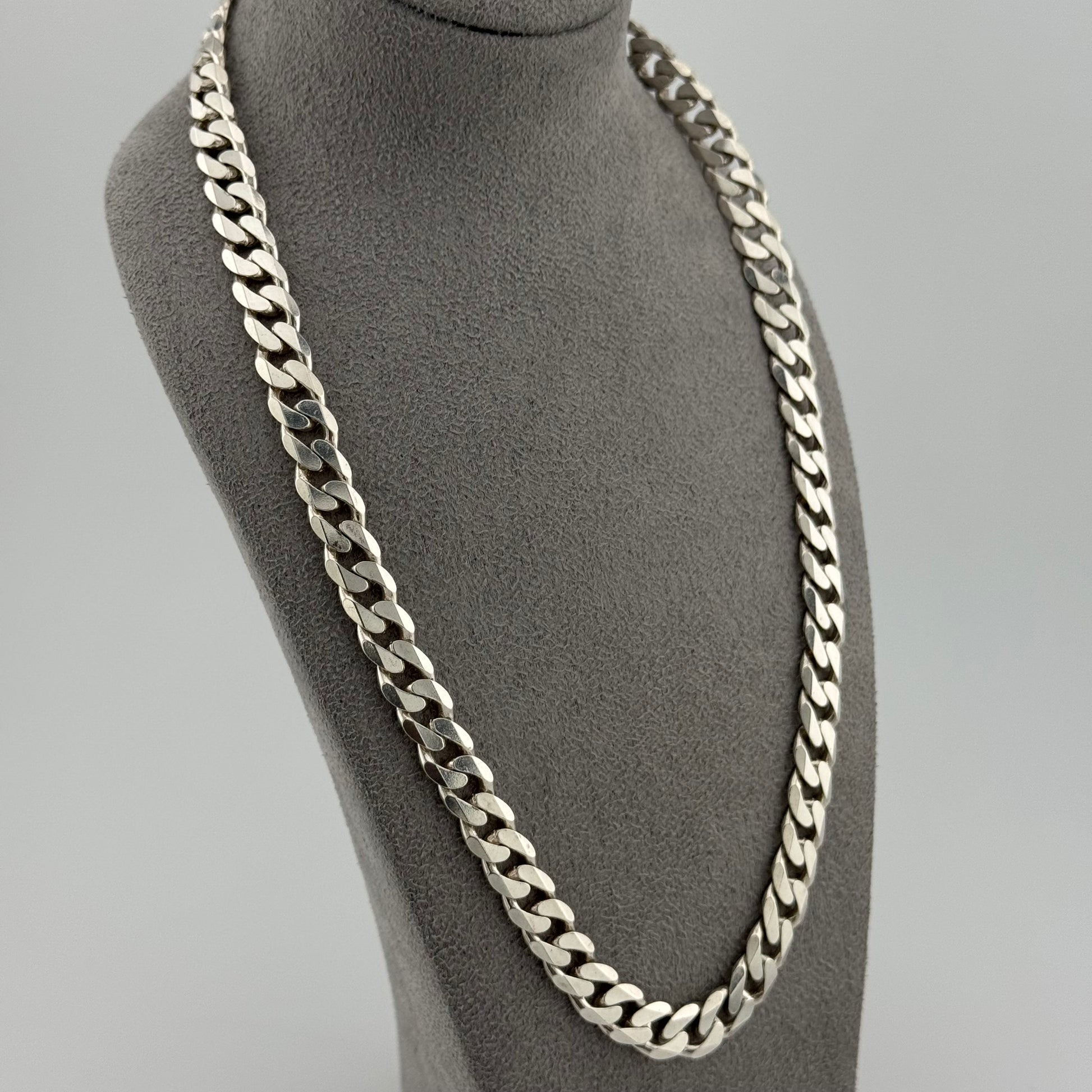 sterling silver heavy mens chain on a grey bust