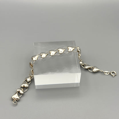 Close-up of puffed heart bracelet and clasp